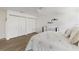 Bright bedroom with a crib and ample closet space at 3783 Beneva Oaks Blvd, Sarasota, FL 34238