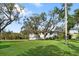 Charming single-Gathering home with a well-manicured lawn and mature trees providing ample shade at 3783 Beneva Oaks Blvd, Sarasota, FL 34238