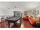 Spacious game room with a pool table, wet bar, and access to the outdoor pool area at 3783 Beneva Oaks Blvd, Sarasota, FL 34238