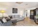 Cozy living room with comfortable seating, wood floors, and bright lighting at 3783 Beneva Oaks Blvd, Sarasota, FL 34238