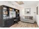 A well-appointed office with a desk, built-in storage, and comfortable seating at 3783 Beneva Oaks Blvd, Sarasota, FL 34238