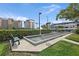 Enjoy a game of Bocce Ball in the community's lush green space next to the condo buildings at 5279 Isla Key S Blvd # 113, St Petersburg, FL 33715