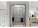 Walk-in closet featuring mirrored doors, ample shelving, and plenty of space for storage at 5279 Isla Key S Blvd # 113, St Petersburg, FL 33715