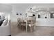 Inviting dining room area offering seamless flow to the kitchen and living room at 5279 Isla Key S Blvd # 113, St Petersburg, FL 33715