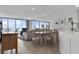 Bright dining room with water views, adjacent to the kitchen and living area at 5279 Isla Key S Blvd # 113, St Petersburg, FL 33715