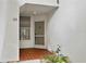 Charming entryway featuring a well-lit porch, tiled flooring, and decorative plants that add a touch of nature at 5279 Isla Key S Blvd # 113, St Petersburg, FL 33715