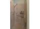 Shower stall with glass doors, a shower head, and a safety bar at 5974 San Michelle Dr, Sarasota, FL 34243