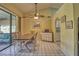Dining area with kitchen access at 5974 San Michelle Dr, Sarasota, FL 34243