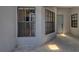 Covered entryway featuring neutral paint and tile flooring at 5974 San Michelle Dr, Sarasota, FL 34243