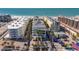 Stunning aerial view of the condo complex near a picturesque beach and ocean at 6512 Midnight Pass Rd # 206, Sarasota, FL 34242