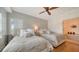 Inviting bedroom showcasing two beds with plush bedding and a glimpse of a luxurious bathroom at 6512 Midnight Pass Rd # 206, Sarasota, FL 34242