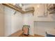 Bright closet with shelving, a bench, and neat storage solutions for a clutter-free living space at 6512 Midnight Pass Rd # 206, Sarasota, FL 34242