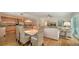 Open-concept dining area adjacent to living room and kitchen, perfect for entertaining at 6512 Midnight Pass Rd # 206, Sarasota, FL 34242