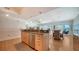 Open-concept living space with kitchen, dining, and living areas with great natural light and modern decor at 6512 Midnight Pass Rd # 206, Sarasota, FL 34242