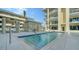 Community swimming pool with modern design, perfect for relaxing and cooling off at 6512 Midnight Pass Rd # 206, Sarasota, FL 34242