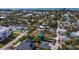 Quaint neighborhood surrounded by lush trees at 691 Linley St, Longboat Key, FL 34228