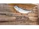 A rustic wooden wall with a decorative fish and the Mar Vista Dockside Restaurant & Pub sign at 691 Linley St, Longboat Key, FL 34228