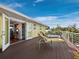 Outdoor deck showcases a bright and airy space for sunbathing on lounge chairs with a lovely view, perfect for relaxation at 691 Linley St, Longboat Key, FL 34228