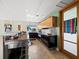Modern kitchen with stainless steel appliances, and a door to the outside at 691 Linley St, Longboat Key, FL 34228