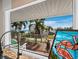 A view of the water and landscape from the kitchen window of this house at 691 Linley St, Longboat Key, FL 34228