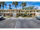 Charming multi-Gathering building with balconies and well-maintained landscaping provides ample parking at 7860 Palm Aire Ln # 104, Sarasota, FL 34243