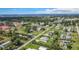 Expansive aerial view of the community showcasing the beautiful landscape and homes with water views at 8430 Truman St, Englewood, FL 34224