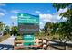 Pioneer Plaza and Dignam Gathering Stage sign showcasing the Sarasota County park entrance at 8430 Truman St, Englewood, FL 34224