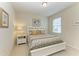 Comfortable bedroom with a window and neutral decor for a relaxing and inviting space at 9828 58Th E St, Parrish, FL 34219
