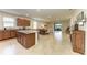 Spacious kitchen with a large island, stainless steel appliances, and an open layout at 9828 58Th E St, Parrish, FL 34219