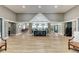 Expansive lobby with stylish furnishings, offering a welcoming and comfortable space for residents and guests at 9828 58Th E St, Parrish, FL 34219