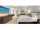 Serene main bedroom offering sitting area and workspace at 1241 Gulf Of Mexico Dr # 1005, Longboat Key, FL 34228