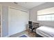 Comfortable bedroom with closet space, study desk, and bright natural lighting at 1409 2Nd E Ave, Bradenton, FL 34208