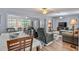 Open-concept living and dining areas with hardwood floors and neutral decor at 1409 2Nd E Ave, Bradenton, FL 34208