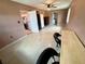 Bonus room with neutral walls and light-colored flooring that connects to the kitchen at 1520 2Nd E Ave, Bradenton, FL 34208