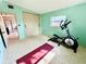 Versatile exercise room with fitness equipment and plenty of natural light at 1520 2Nd E Ave, Bradenton, FL 34208