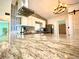 Modern kitchen boasts granite countertops, stainless steel appliances, and a stylish range hood at 1520 2Nd E Ave, Bradenton, FL 34208