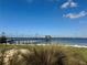 Picturesque pier with covered gazebo extending into the water at 1520 2Nd E Ave, Bradenton, FL 34208