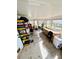 Work room full of tools and equipment with walls of windows to let in natural light at 1520 2Nd E Ave, Bradenton, FL 34208