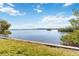 Scenic water view showing a tranquil bay with lush mangroves, blue sky, and a beautiful horizon at 1621 Memory Ln, Sarasota, FL 34231