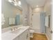 Cozy bathroom featuring white vanity with a white countertop, toilet, and a shower tub at 16218 Umbria Pl, Bradenton, FL 34211