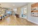 Open-concept floor plan boasts a dining area, living room, and seamless flow for entertaining and Gathering enjoyment at 16218 Umbria Pl, Bradenton, FL 34211