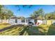 Spacious backyard with a patio, perfect for outdoor living and entertaining at 2312 Java Plum Ave, Sarasota, FL 34232