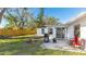 Outdoor patio with grill, perfect for barbecues and enjoying the serene backyard at 2312 Java Plum Ave, Sarasota, FL 34232