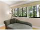Sitting area with a large window and comfortable chaise lounge at 2613 Temple St, Sarasota, FL 34239