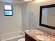 Bright bathroom features tiled shower, vanity with granite countertop, and updated fixtures at 2712 36Th Avenue E Ter, Bradenton, FL 34208