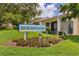 Well-manicured landscape in front of community sign, Morningside at 2921 63Rd W St # 2921, Bradenton, FL 34209