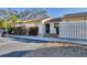 Cozy home featuring white picket fence, neutral paint, and mature landscaping at 2921 63Rd W St # 2921, Bradenton, FL 34209