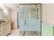 Bathroom featuring a large glass enclosed shower and a beautifully decorated vanity at 3970 Country View Dr, Sarasota, FL 34233