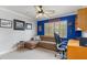 Bedroom with a sleeper sofa, workspace, and bright window for natural light at 3970 Country View Dr, Sarasota, FL 34233
