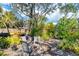 Tranquil backyard with an array of seating perfect for outdoor relaxation at 4062 S Shade Ave, Sarasota, FL 34231